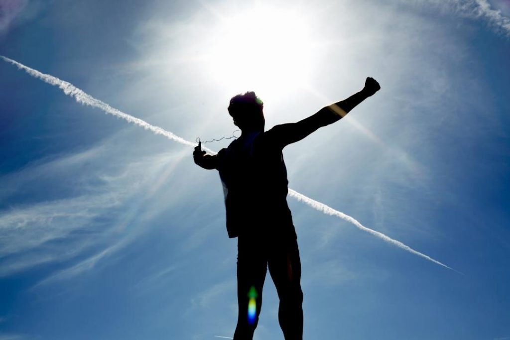 shift negative self-talk man looking at bright sky